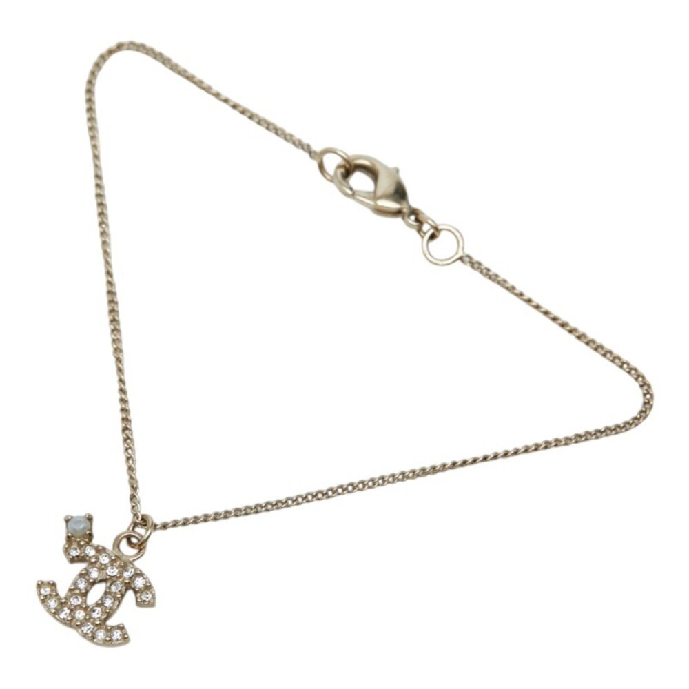 CHANEL Gold Pearl Logo Charm Bracelet